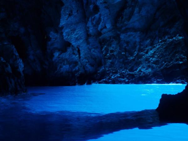 Blue Cave, a beautiful sea cave on Bisevo Island in Croatia 