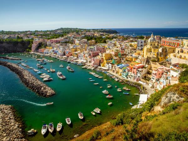 View of yachts in Corricella Harbour on Procida Island, Italy