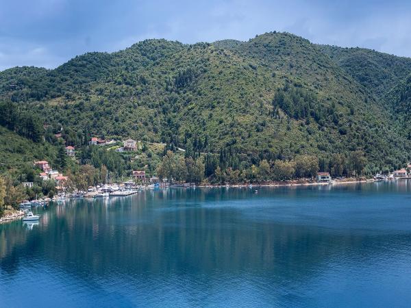 Tree lined bay of Vathi, Ithaca Island, Greece