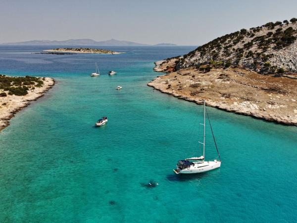 Yachts anchored in a beautiful bay in the Saronic Gulf of Greece