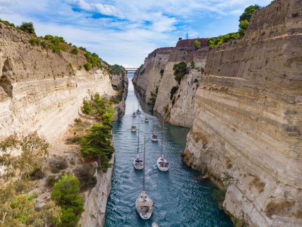 Yachts sailing through the Corinth Canal