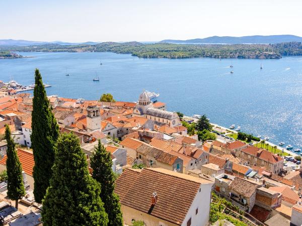 View of yachts and Old Town of Sibenik in Croatia