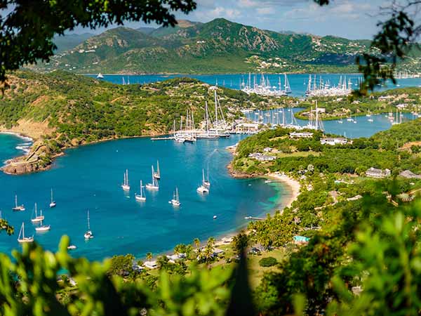 English harbour and Nelsons Dockyard in Antigua and Barbuda, paradise island of antigua in the caribbean at the viewpoint of Shirley Heights and Freeman's bay