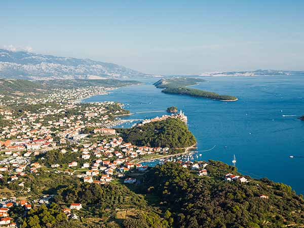 aerial view of yachts sailing the Croatia coastline. Rab island, Croatia.