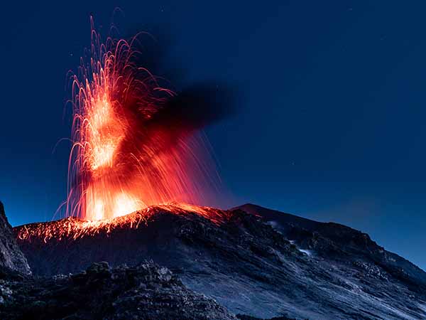 Stromboli volcano eruption in the night